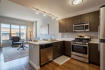 Kitchen with stainless steel appliances and a counter top